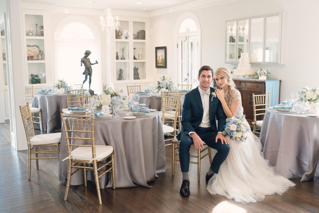 Bride & Groom at Wedding Venue Sitting with Tables Capen House | Anna Christine Events Orlando Central Florida Wedding Planner