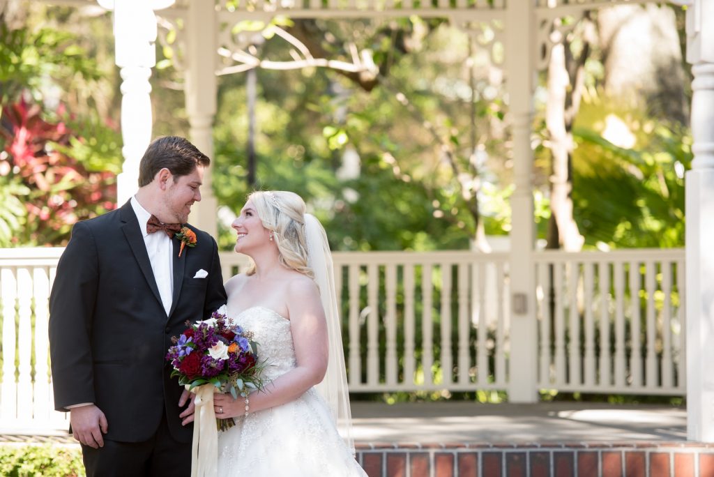 First Look Bride & Groom Courtyard at Lake Lucerne | Classic Purple & Orange Wedding Football Texas Longhorns Sports Lake Lucerne Courtyard Anna Christine Events Orlando Kathy Thomas Photography