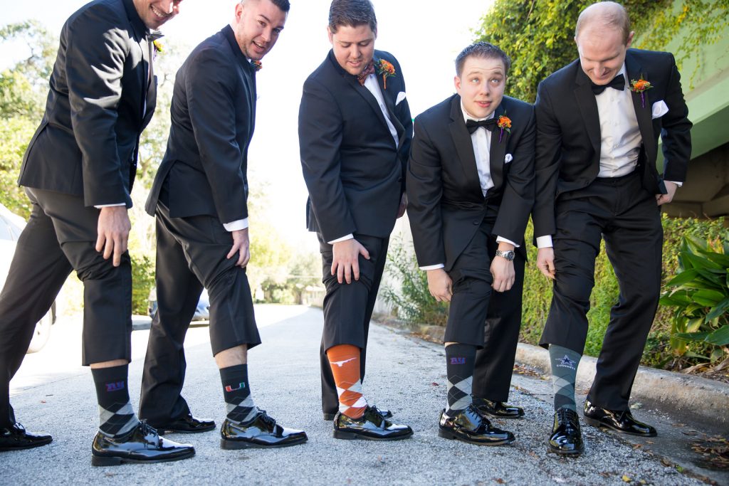 Groom Groomsmen Matching Socks Sports Teams Football | Classic Purple & Orange Wedding Football Texas Longhorns Sports Lake Lucerne Courtyard Anna Christine Events Orlando Kathy Thomas Photography