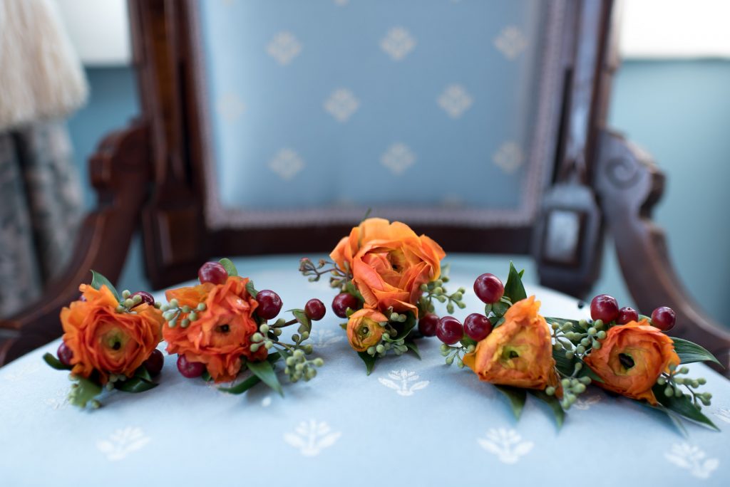 Orange Boutonnieres Flowers by Lesley | Classic Purple & Orange Wedding Football Texas Longhorns Sports Lake Lucerne Courtyard Anna Christine Events Orlando Kathy Thomas Photography
