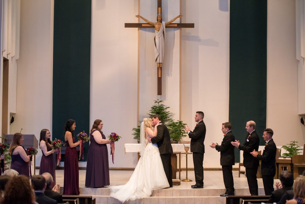 Bride & Groom Ceremony St. Margaret Mary Catholic Church | Classic Purple & Orange Wedding Football Texas Longhorns Sports Lake Lucerne Courtyard Anna Christine Events Orlando Kathy Thomas Photography