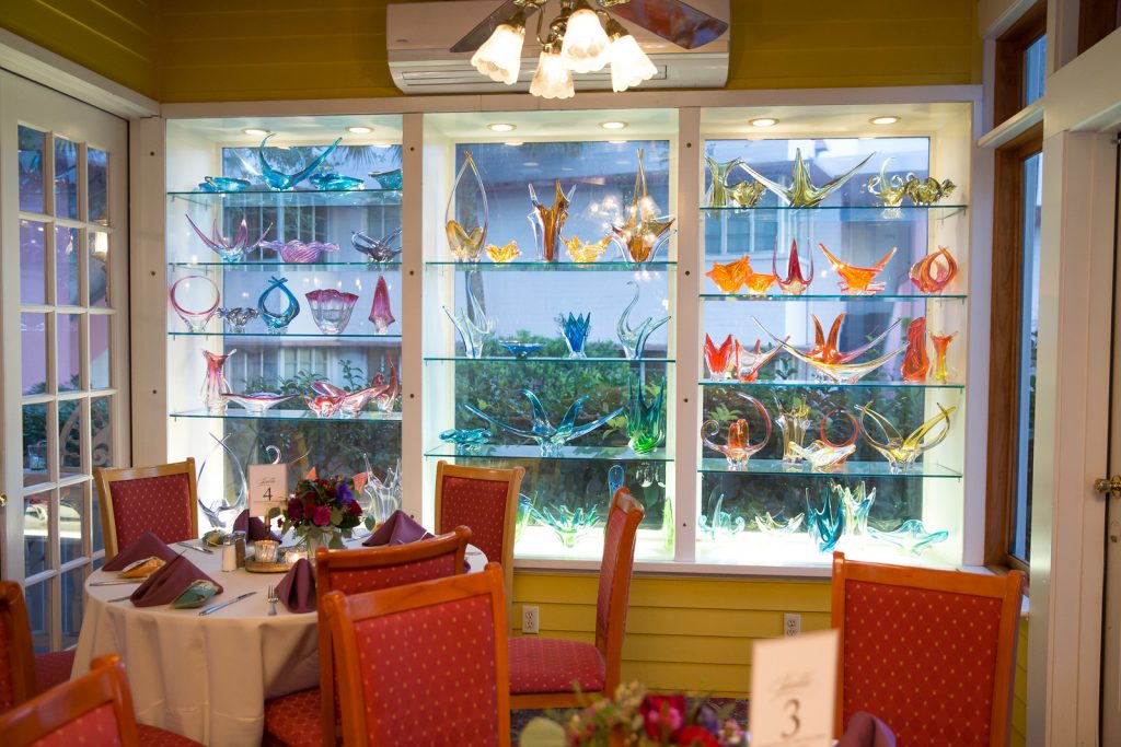 Glass Display Window Courtyard at Lake Lucerne Reception | Classic Purple & Orange Wedding Football Texas Longhorns Sports Lake Lucerne Courtyard Anna Christine Events Orlando Kathy Thomas Photography