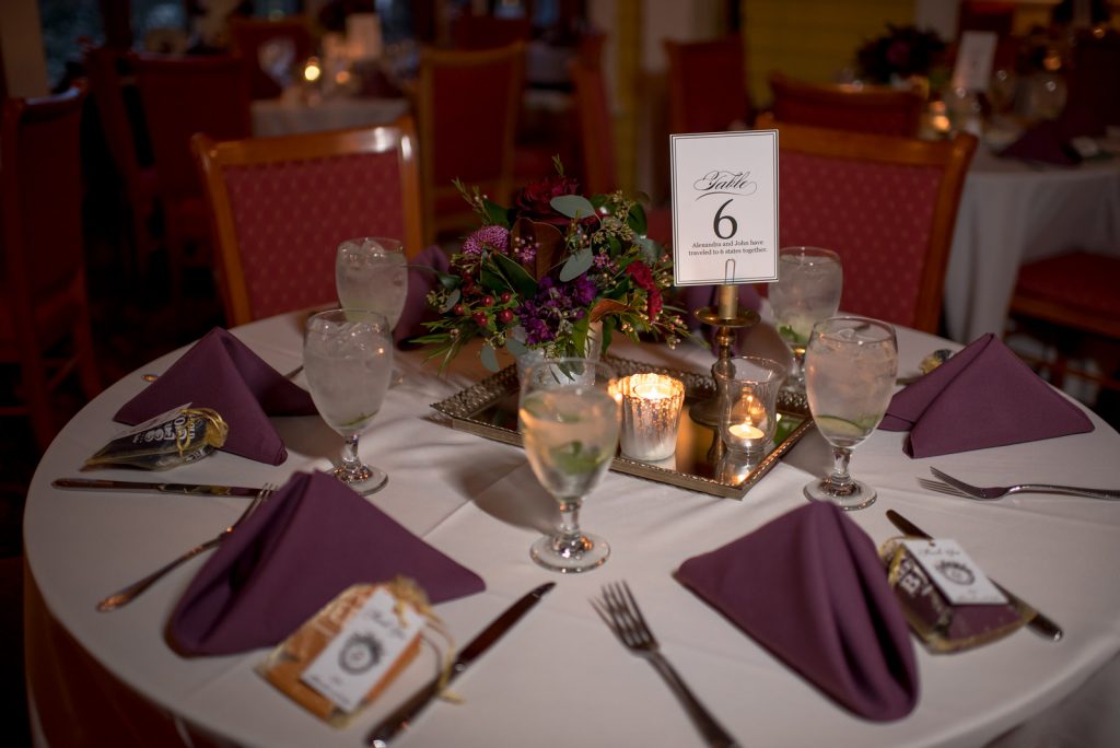 Table Setting Table Number Memories | Courtyard at Lake Lucerne Reception | Classic Purple & Orange Wedding Football Texas Longhorns Sports Lake Lucerne Courtyard Anna Christine Events Orlando Kathy Thomas Photography