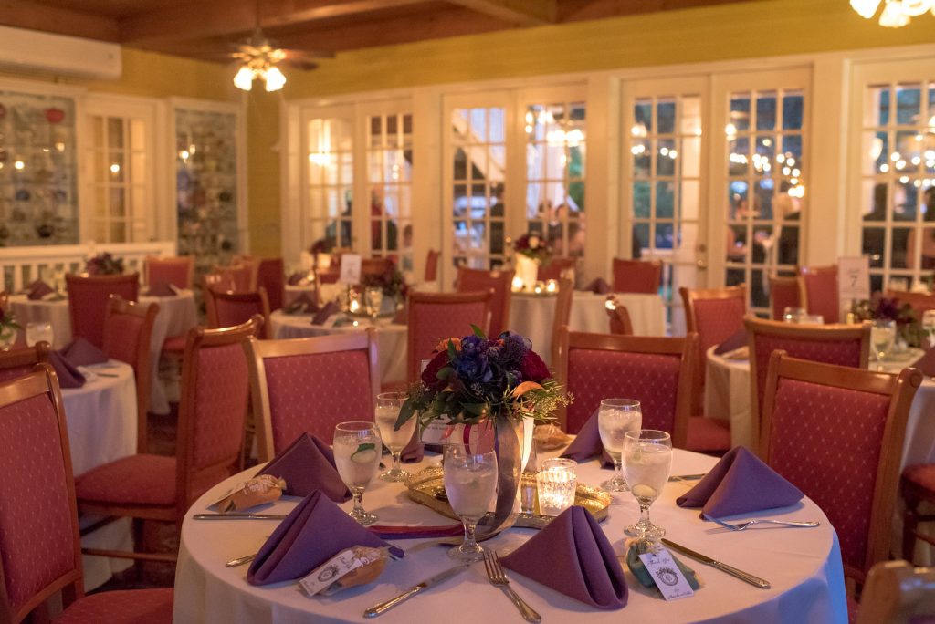 Reception Dinner Table Settings | Courtyard at Lake Lucerne Reception | Classic Purple & Orange Wedding Football Texas Longhorns Sports Lake Lucerne Courtyard Anna Christine Events Orlando Kathy Thomas Photography