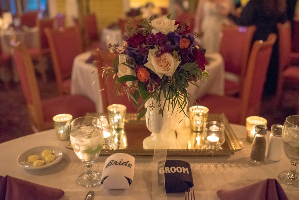 Sweetheart Table Reception Dinner Table Settings | Courtyard at Lake Lucerne Reception | Classic Purple & Orange Wedding Football Texas Longhorns Sports Lake Lucerne Courtyard Anna Christine Events Orlando Kathy Thomas Photography