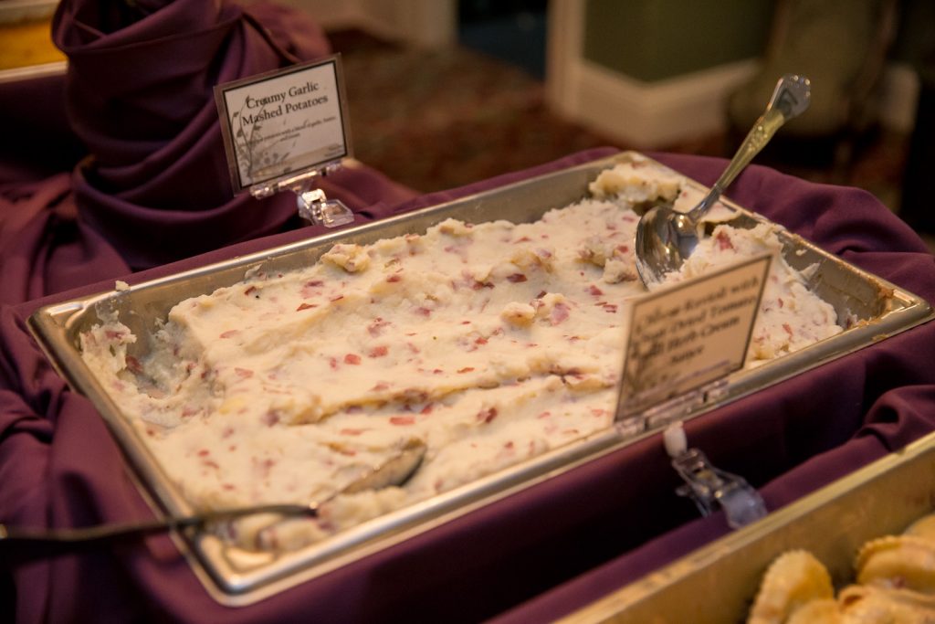 John Michaels Catering Buffet | The Courtyard at Lake Lucerne Classic Purple & Orange Wedding Football Texas Longhorns Sports Lake Lucerne Courtyard Anna Christine Events Orlando Kathy Thomas Photography