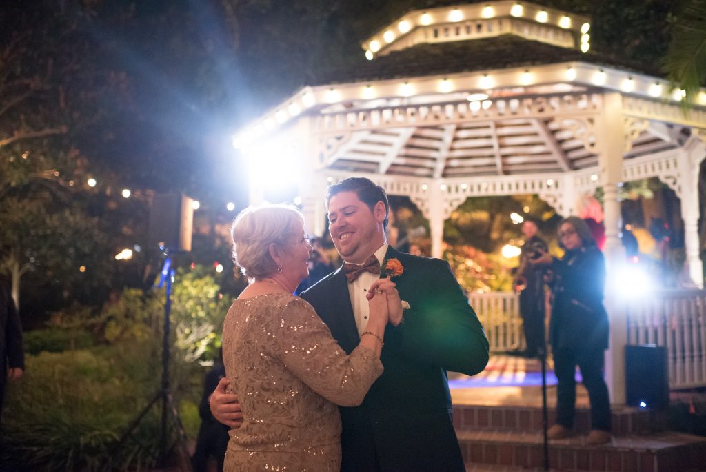 Mother Son Dance The Bay Kings Band | The Courtyard at Lake Lucerne Classic Purple & Orange Wedding Football Texas Longhorns Sports Lake Lucerne Courtyard Anna Christine Events Orlando Kathy Thomas Photography