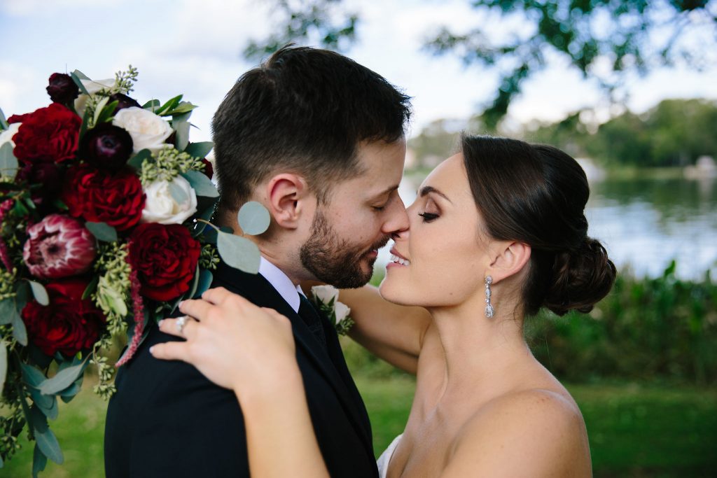Bride & Groom Kiss | Romantic Red & White Capen House Wedding Geometric Gold Anna Christine Events J Lebron Photography