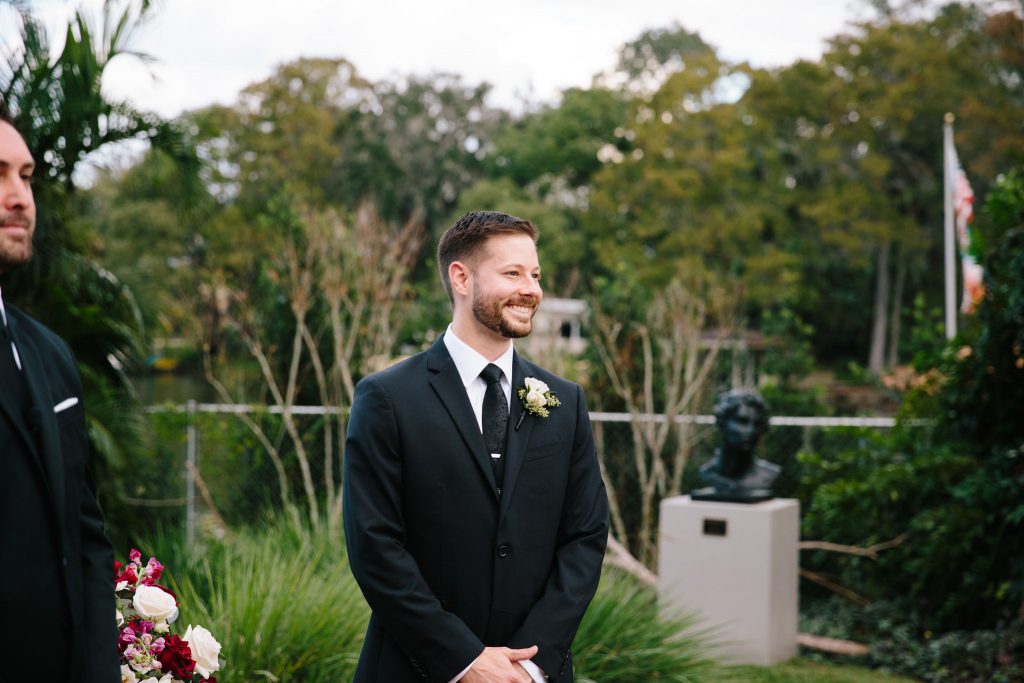 Groom Waiting at Ceremony | Romantic Red & White Capen House Wedding Geometric Gold Anna Christine Events J Lebron Photography