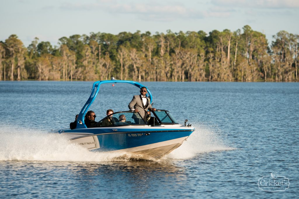 Groom Entrance on Boat | Classic Pink & White Beach Wedding Paradise Cove Lakeside Orlando Anna Christine Events Cricket’s Photography